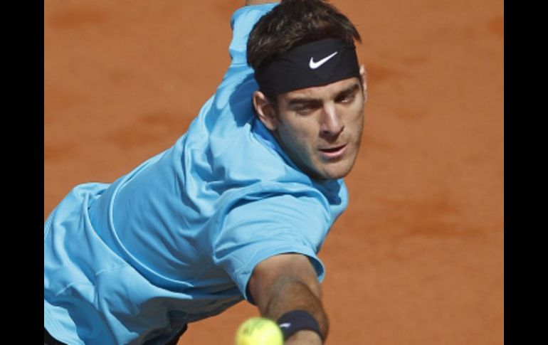 Juan Martín del Potro devuelve la pelota a su contrincante Ivo Karlovic. AP  /