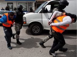 Los detenidos y objetos asegurados fueron puestos a disposición de un agente adscrito a la SIEDO. ARCHIVO  /