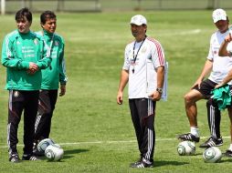 Luis Fernando Tena y José Manuel de la Torre, durante sesión de entrenamiento. MEXSPORT  /