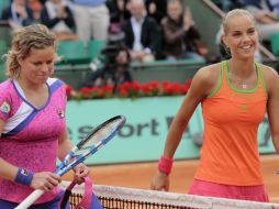 Kim Clijsters (izq.) se va del torneo de París en la segunda ronda. AFP  /