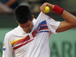 El tenista serbio, Novak Djokovic, tras ser eliminado por Federer en el Roland Garros. EFE  /