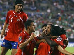 Jugadores de Costa Rica celebrando el empate. MEXSPORT  /