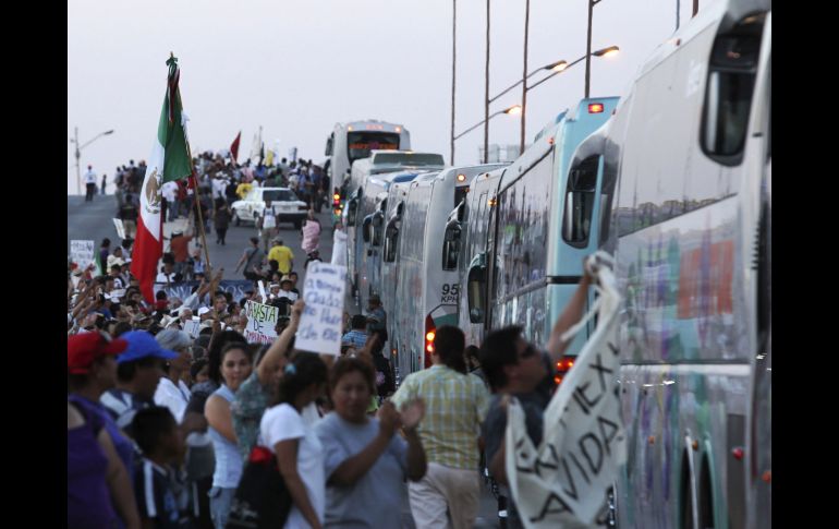 Residentes de Ciudad Juárez participan en la Caravana por la Paz con Justicia y Dignidad. AP  /