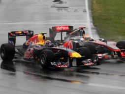 Mark Webber (izq), piloto de la escudería Red Bull, durante en Gran Premio de Canadá. AP  /