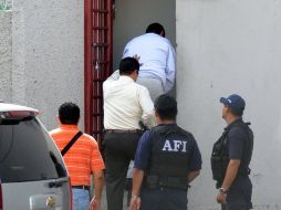 Los 11 detenidos en la residencia de Hank Rhon comparecieron en el juzgado de Baja California. ARCHIVO  /