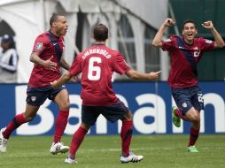 Jugadores de Estados Unidos celebrando gol contra Jamaica. MEXSPORT  /