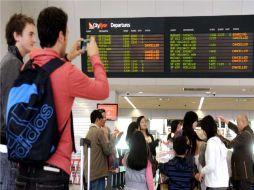 Aerolíneas de Australia buscan superar las demoras que sufrían decenas de miles de pasajeros. AFP  /