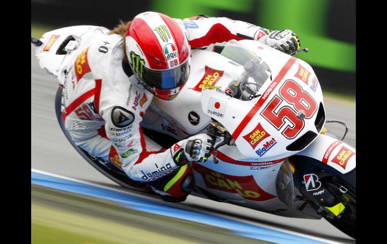 Simoncelli manejando su Honda en Moto GP Assen. AP  /