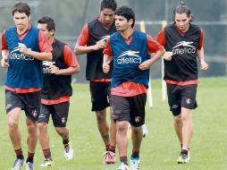 Luis Robles (centro) en entrenamiento con Atlas. MEXSPORT  /