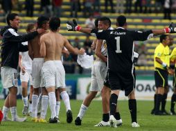 Celebración de la selección uruguaya al término del partido. MEXSPORT  /