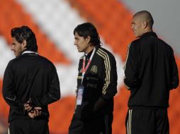 Rafael Marquez y Jorge Enríquez en el estadio de las Mavinas hoy jueves. AP  /