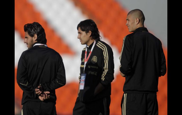 Rafael Marquez y Jorge Enríquez en el estadio de las Mavinas hoy jueves. AP  /