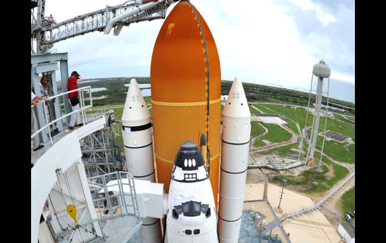 Unas tres horas antes los astronautas, con sus trajes color anaranjado, entrarán a la cabina del transbordador. AP  /