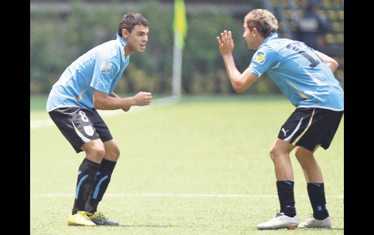 Elbio Álvarez y Gianni Rodríguez, integrantes del equipo charrúa. MEXSPORT  /