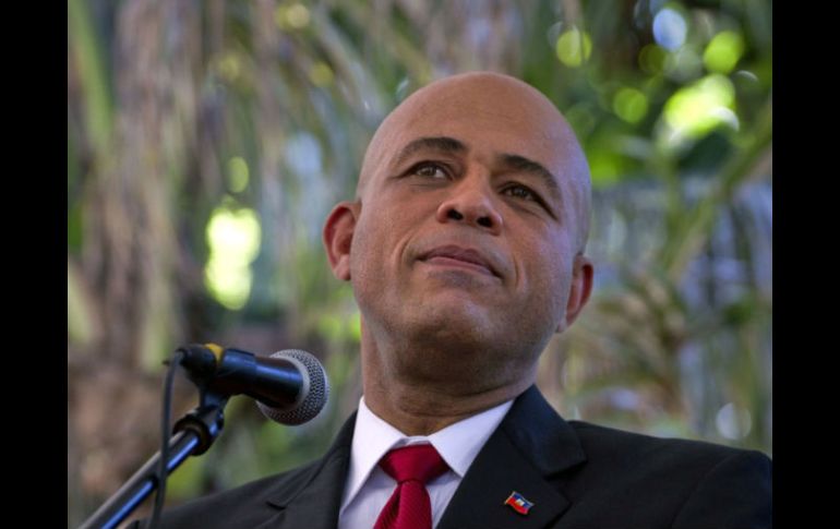 'Hoy quiero recordarles que aún estoy decidido a completar el proceso de la reconstrucción de Haití', declaró Martelly. ARCHIVO  /