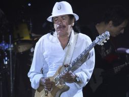 El guitarrista tiene planeada una presentación con el cómico George López. AP  /