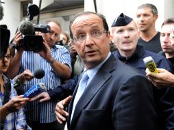 Momento en que Francois Hollande arriba a la fiscalía para ser interrogado. REUTERS  /