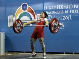 La mayoría de las atletas menores de edad han demostrado tener gran fuerza, como la pesista Susana Fuentes. MEXSPORT  /