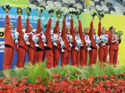 El equipo canadiense en el podio para recibir la medalla de bronce. AFP  /