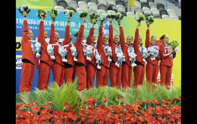 El equipo canadiense en el podio para recibir la medalla de bronce. AFP  /