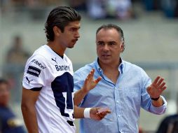 Eduardo Herrera (I) y Guillermo Vazquez durante el pasado juego del Apertura 2011. MEXSPORT  /