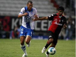 Lucas Silva, de Puebla (I) durante juego de la semana 1 del Apertura 2011. MEXSPORT  /