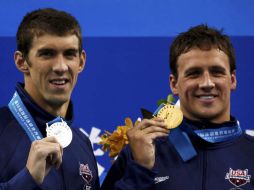 Michael Phelps no logró superar a su compatriota Lochte, aún así ambos comparten el podio con medallas de plata y oro. REUTERS  /