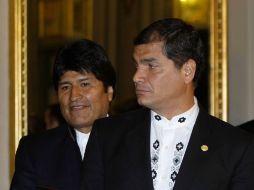 Correa, junto con su homólogo Evo Morales. AP  /