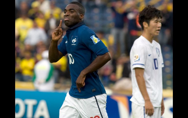 Gilles Sunu, de Francia, festeja su gol ante Corea del Sur. AP  /