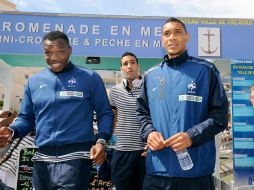 Jugadores de la selección francesa, Steve Mandanda (izq), Adil Rami (ctr) y Guillaume Hoarau. AFP  /