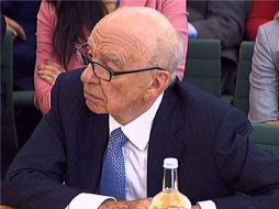 Rupert Murdoch y su hijo fueron interrogados en el Parlamento sobre las escuchas realizadas por News of the World. ARCHIVO  /