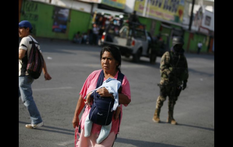 Los narcotraficantes hirieron a una pareja, pero las balaz alcanzaron a dos menores. AP  /