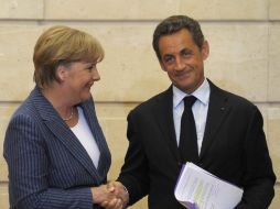 Sarkozy y Merkel propusieron una mayor integración de la zona euro y un aumento del rigor presupuestario. EFE  /