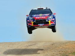 Loeb y la marca de automoviles Citroen seguirán juntos hasta 2013. AFP  /