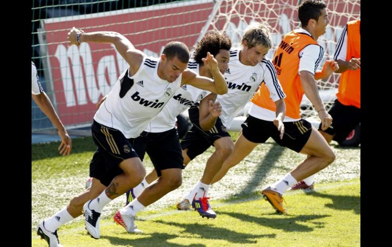 Jugadores del Real Madrid, durante sesión de entrenamiento esta tarde en la Ciudad Deportiva de Valdebebas. EFE  /