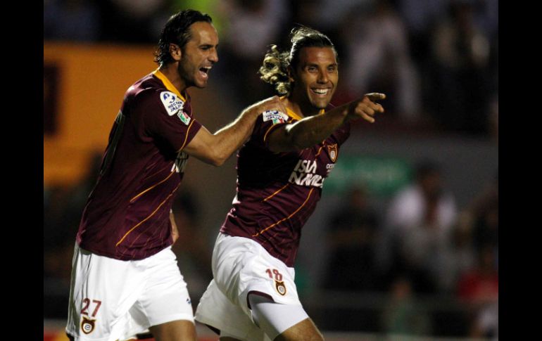 Jorge Zamogilny de Estudiantes (D), festeja durante el partido contra Pachuca hace unos cuantos dias. MEXSPORT  /