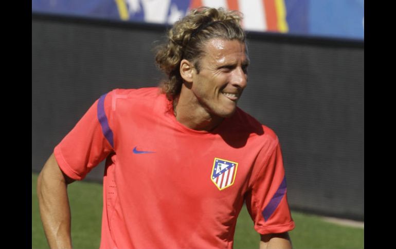 En su historia, Diego Forlán se va con 96 goles en 198 encuentros. AP  /