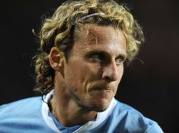 Diego Forlán viste la camisa de la selección de su país. AFP  /