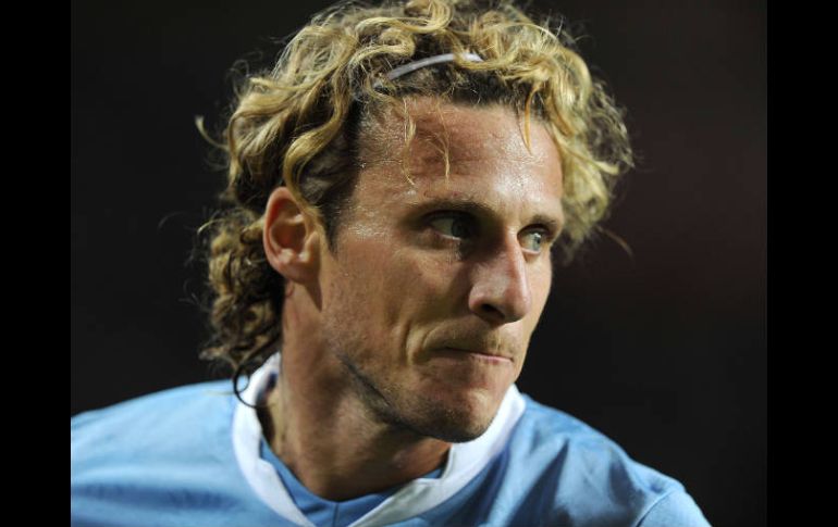 Diego Forlán viste la camisa de la selección de su país. AFP  /