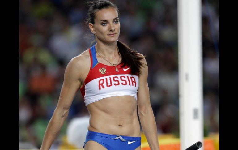 La atleta rusa Yelena Isinbayeva durante la final femenina de salto con pértiga. AP  /