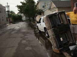 Tras el paso del Huracán Irene por varias ciudades del Este de Estados Unidos, buscará la pronta reestructuración. AFP  /