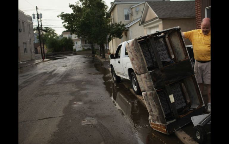 Tras el paso del Huracán Irene por varias ciudades del Este de Estados Unidos, buscará la pronta reestructuración. AFP  /