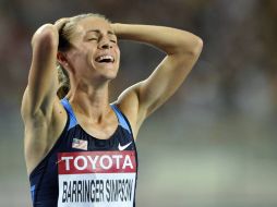 Simpson celebra haber ganado los mil 500 metros femenil en el Mundial de Atletismo. REUTERS  /