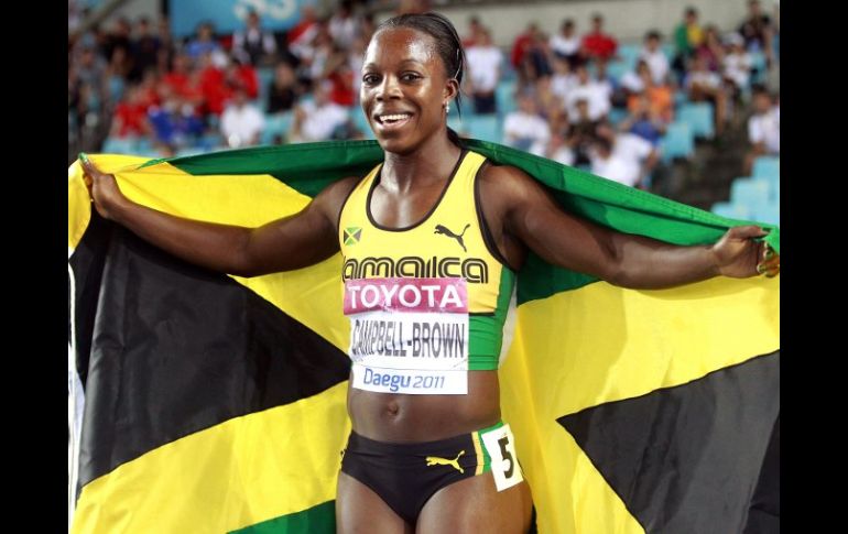 La atleta Veronica Campbell-Brown de Jamaica celebra su victoria en la carrera de 200 metros mujeres. EFE  /