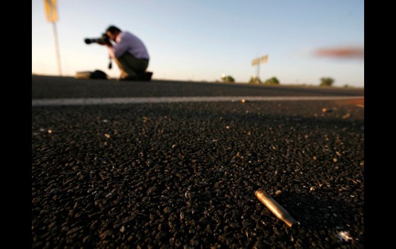 El cuerpo presentaba disparos de armas de fuego. ARCHIVO  /