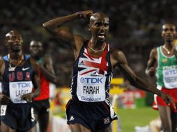 Mo Farah celebra su victoria en la prueba de cinco mil metros. AP  /