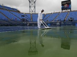 Se espera que por lo menos se puedan jugar los partidos del cuadro masculino. AP  /