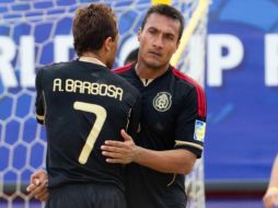 Antonio Barbosa y José Luis Navarrete se lamentan de la derrota al final del encuentro. MEXSPORT  /