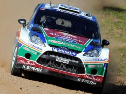 El finés Latvala conduce su Ford durante el Rally de Australia. AFP  /