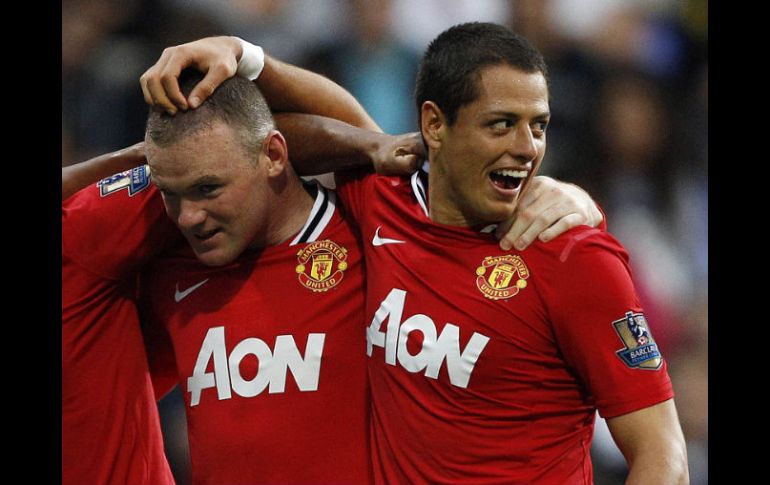 Ferguson también se mostró contento con la gran dupla que conforman Hernandez (D) y Rooney. REUTERS  /